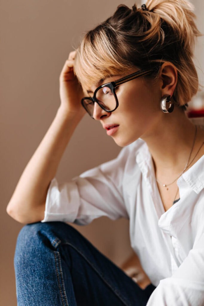 a woman wearing glasses